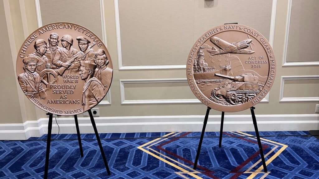 Large replicas of the Congressional Gold Medals for Chinese American WWII veterans