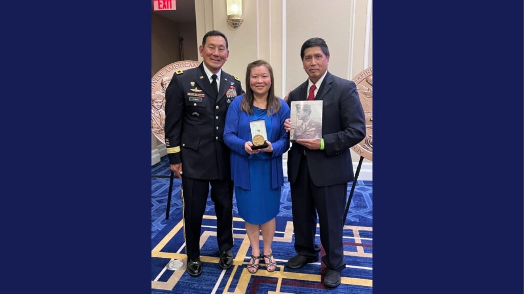 Ricky and Grace Leo posing with Major General K.K. Chinn after Grace receives a Congressional Gold Medal on behalf of her uncle Goon Lew