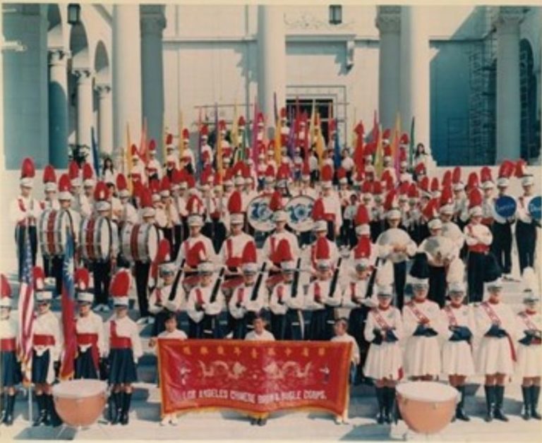 Photo of the Drum & Bugle Display room with a closeup picture of the Los Angeles Chinese Drum & Bugle Corps in uniform