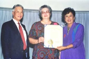 Photo of the presentation of a certificate at California State University Los Angeles