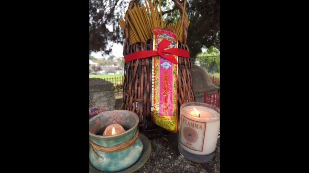 Photo in incense and candles at Evergreen Cemetery of Ching Ming