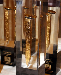 Golden Spike Award, a gold railroad spike encased in clear plastic