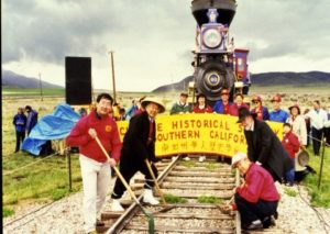 Photo reenactment of the completion of the Transcontinental Railroad by the laying of the final Golden Spike