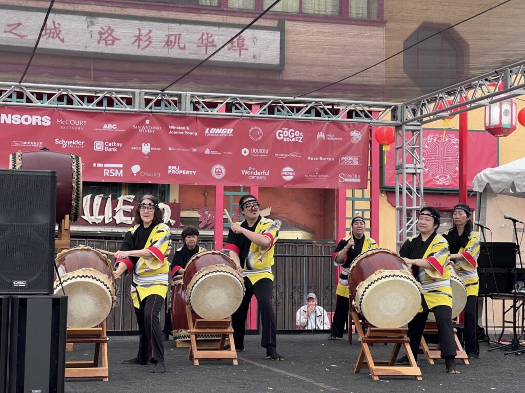 Taiko drummers performing on the Central Plaza stage at the Firecracker Run