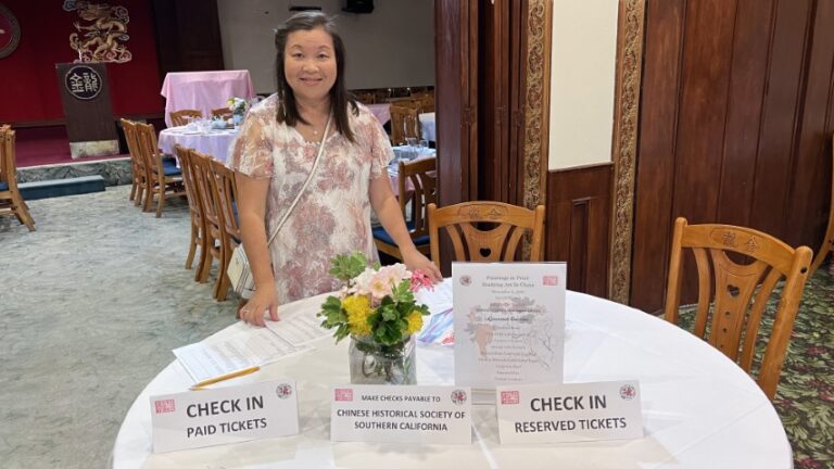Board member Grace Leo at the check in table.